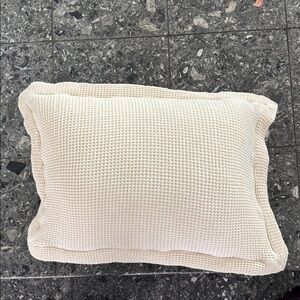 Super soft ivory stretch waffle ivory decorative accent pillow.